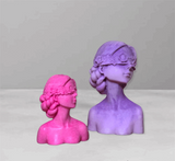 Blindfolded girl molds