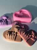 Heart holding hands mold