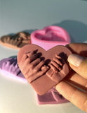 Heart holding hands mold